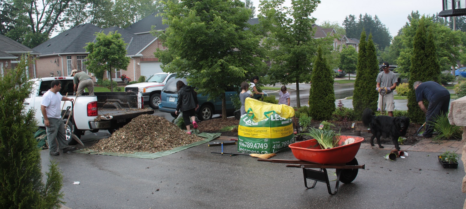 Local residents work on a Lake Wilcox SNAP eco-landscaping project