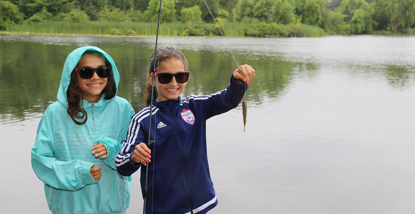 young anglers show off their catch at Heart Lake Conservation Park