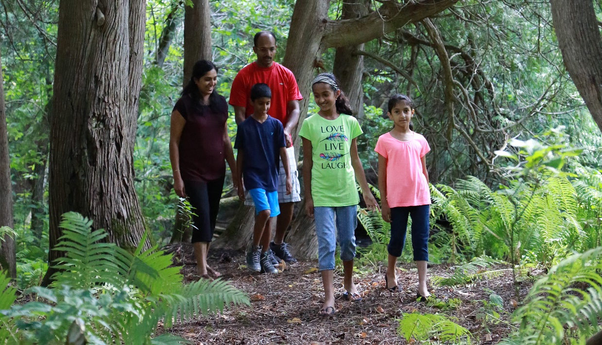 parents with young children explore trail at Albion Hills Conservation Park as part of TRCA Outdoor Family Experience