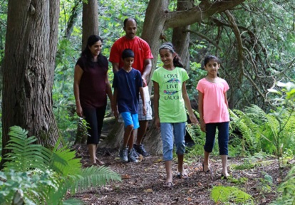 parents with young children explore trail at Albion Hills Conservation Park as part of TRCA Outdoor Family Program