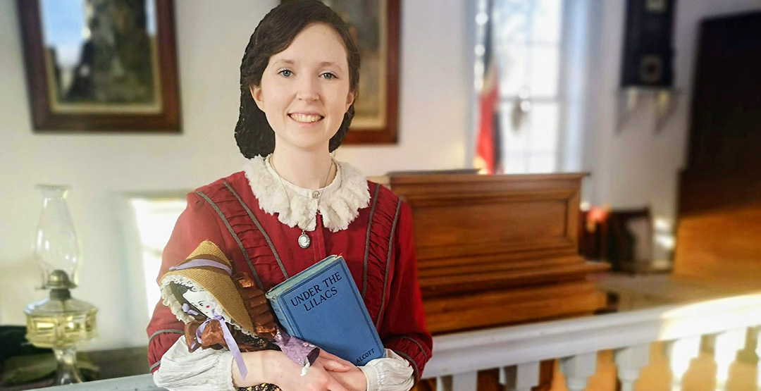 history actor in 19th century costume portrays Delilah Thompson in Black Creek Pioneer Village