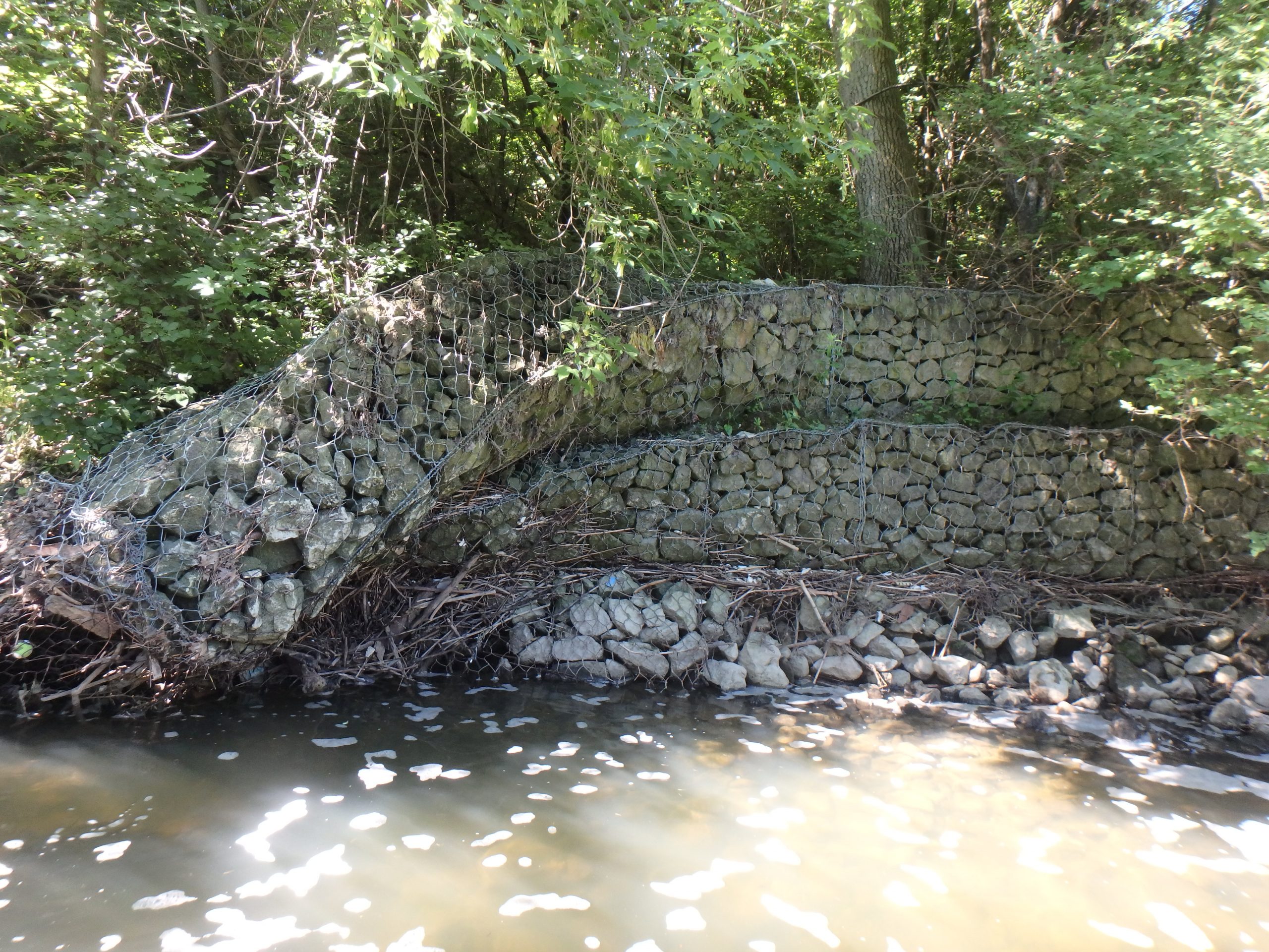 failing gabion basket retaining wall in seton park