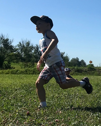 summer camper enjoys outdoor activity at Claremont Nature Centre