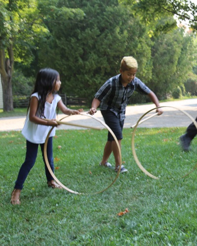 summer campers play 19th century sports and games at Black Creek Pioneer Village