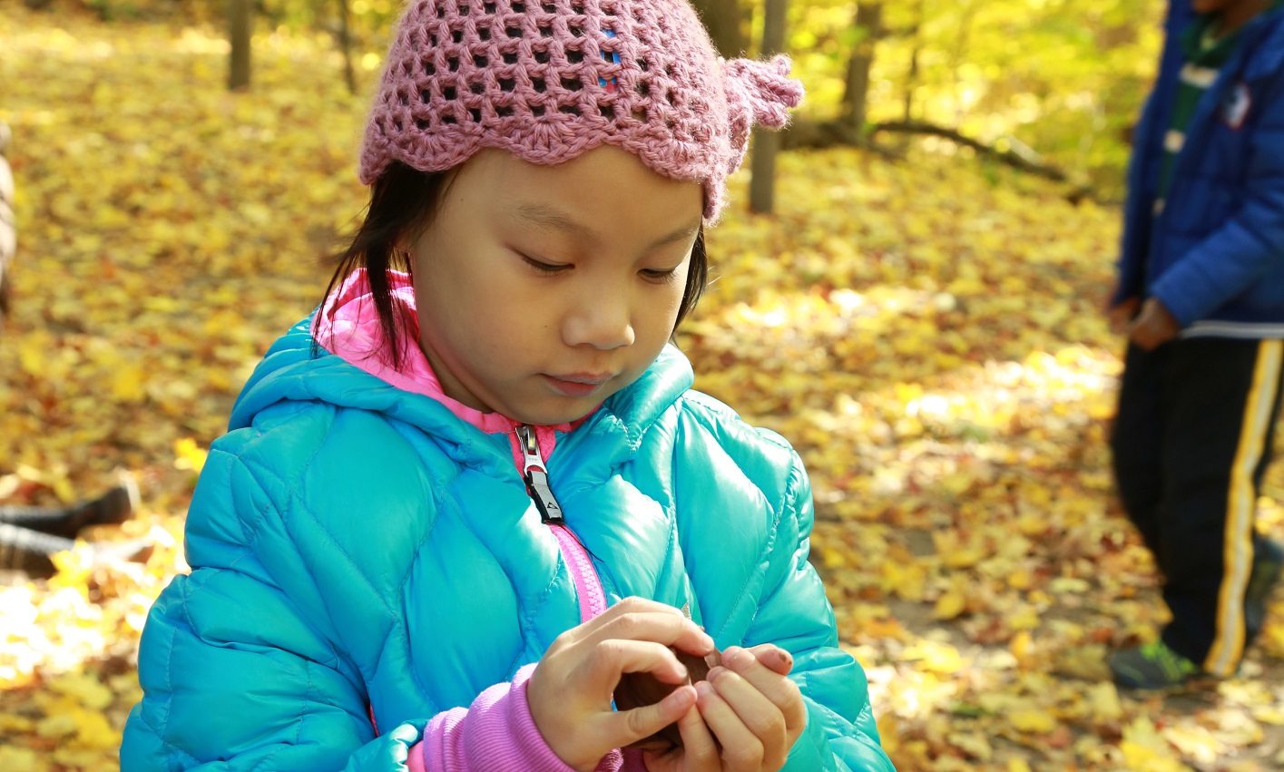 primary student enjoys an outdoor learning experience at the Nature School at Claireville Conservation Area