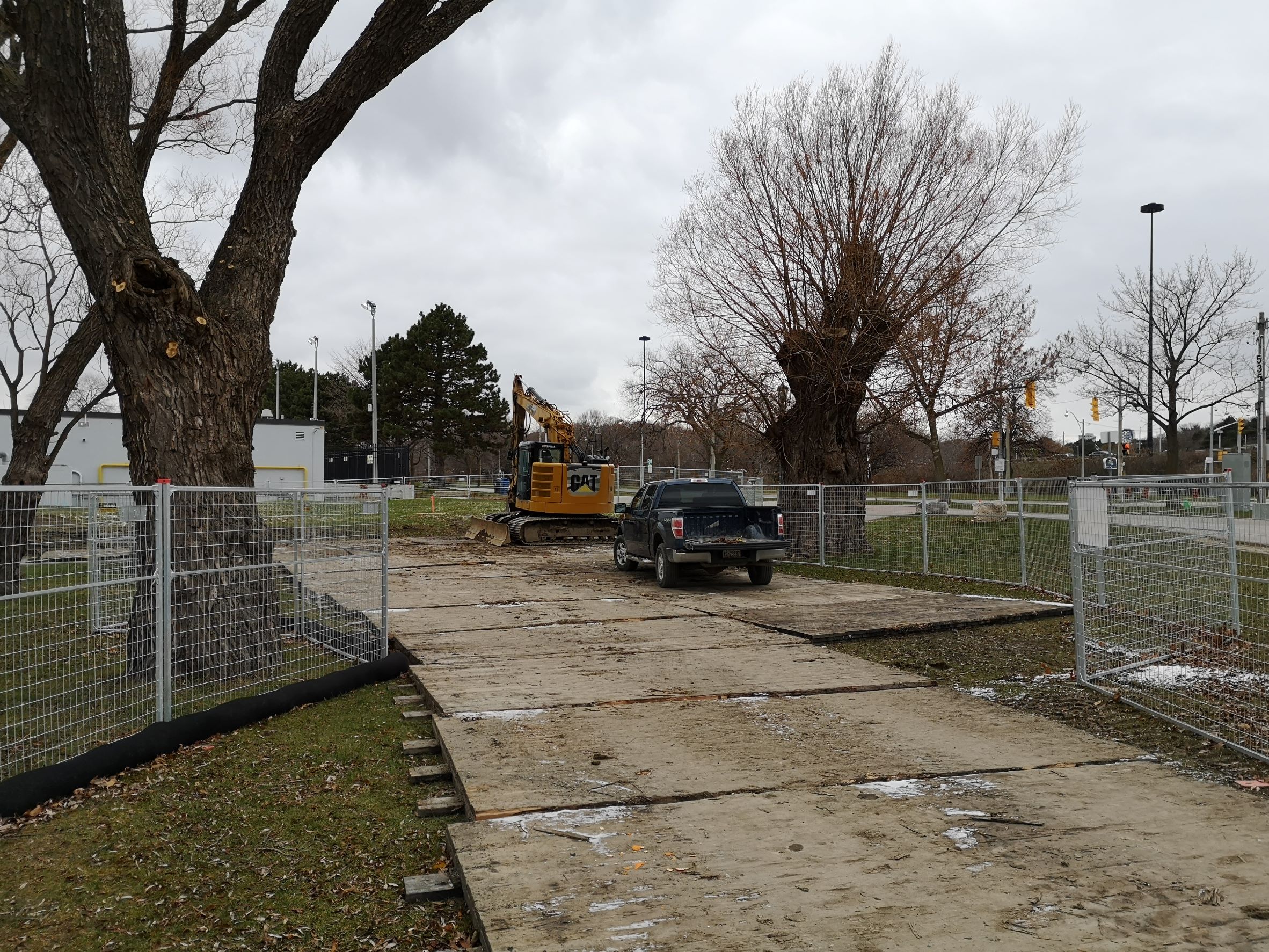 Photo showing installing of mud mats along the access road
