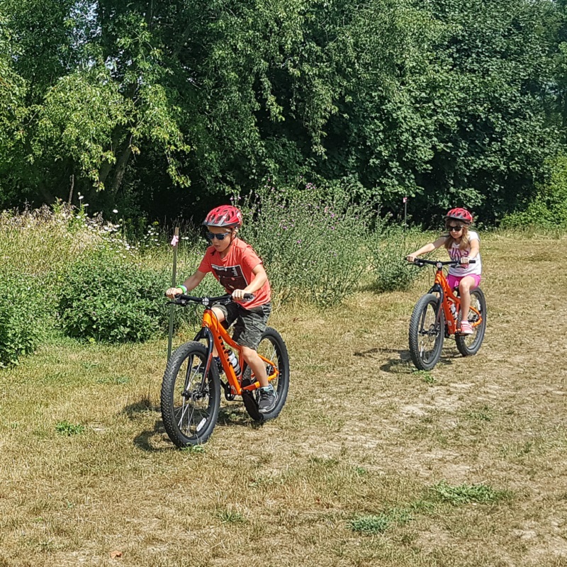 youngsters explore the out-of-doors on mountain bikes during summer camp at Albion Hills Field Centre