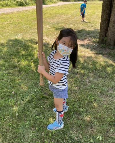 summer camper plays baseball the old fashioned way at Black Creek Pioneer Village