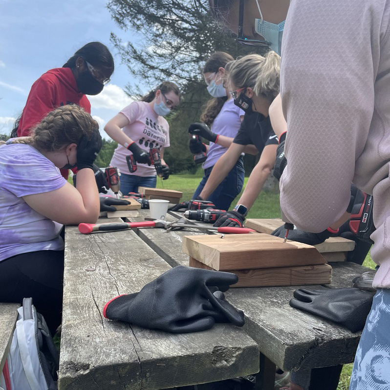 Girls Can Too participants practice the safe use of power tools