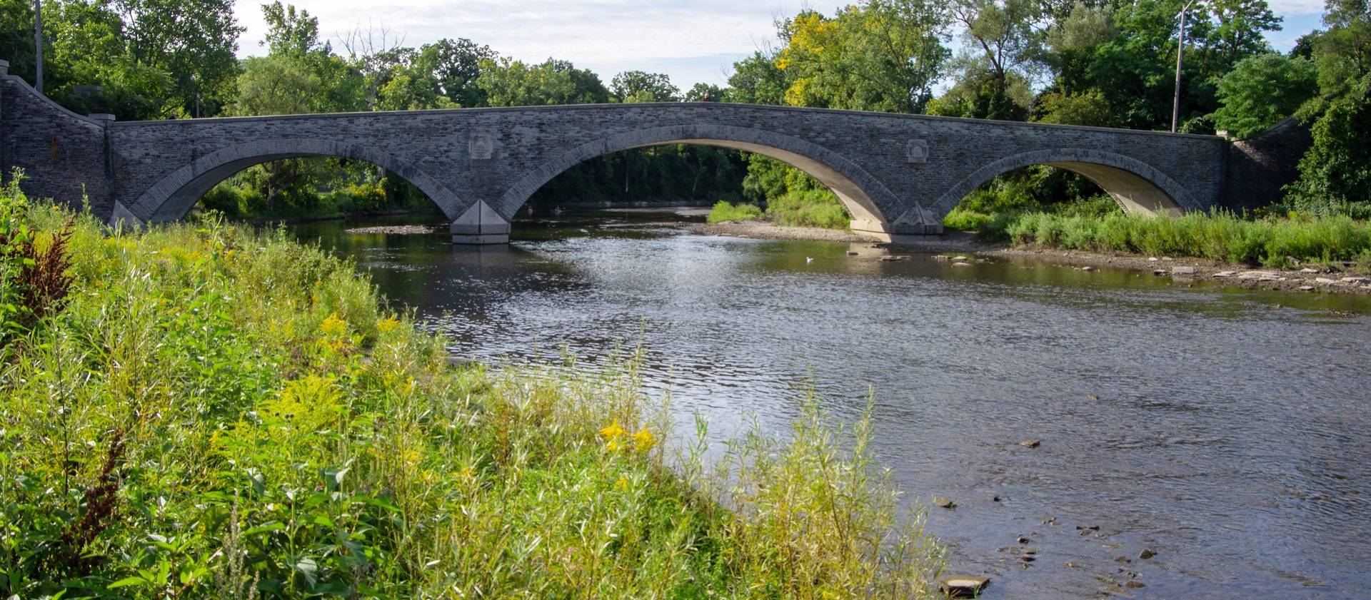 the Old Mill Bridge spans the Humber River at Etienne Brule Park