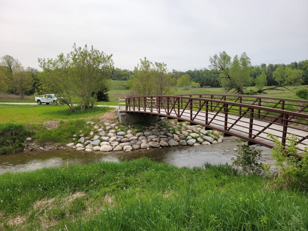 After photo of site showing a completed vegetated rock buttress and restored site. Source: TRCA, 2023.