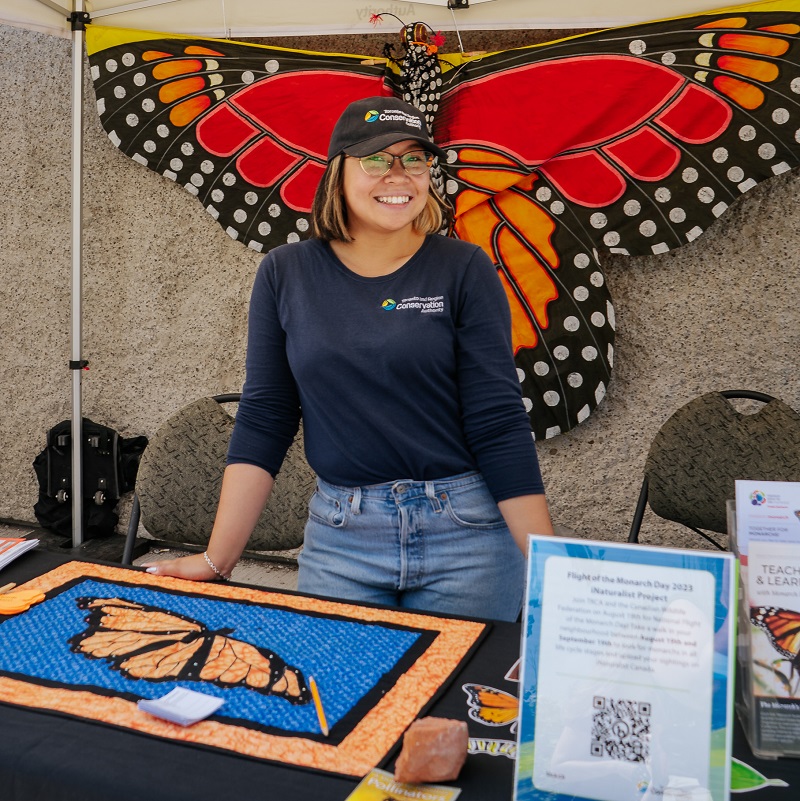 TRCA educator greets visitors to Butterfly Festival at Tommy Thompson Park