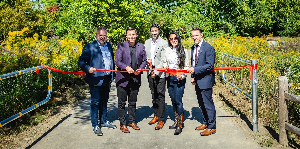 dignitaries participate in ribbon cutting ceremony at the opening of the Claireville Multi-Use Trail