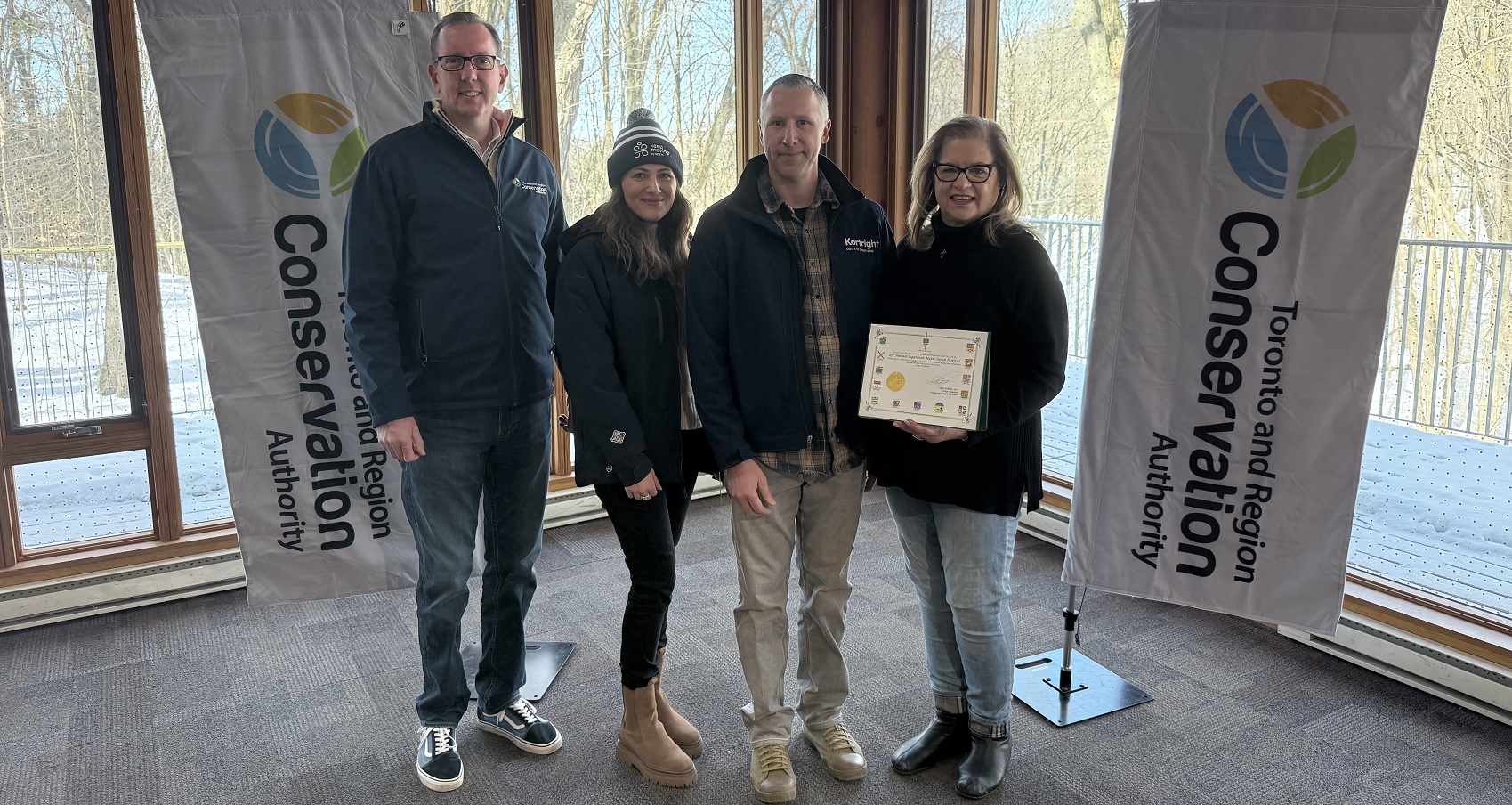 TRCA team members and dignitaries take part in the official opening of the Sugarbush Maple Syrup Festival at Kortright Centre for Conservation