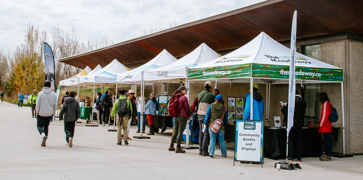 community booths and displays at the spring bird festival at Tommy Thompson Park