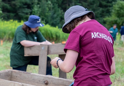 a high school student takes part in the Boyd Archaeological Field School program
