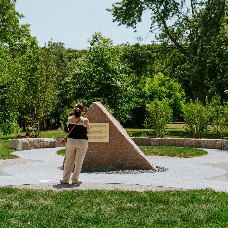 a visitor to Morningside Park pauses for contemplation at the new Indigenous gathering space