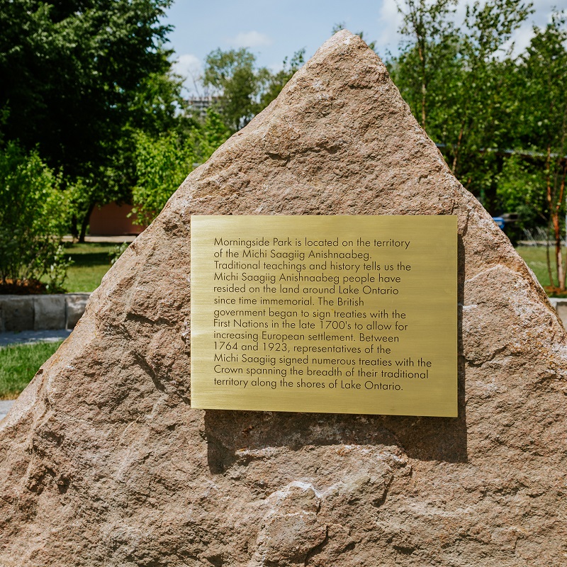 a land acknowledgment plaque at the new Indigenous gathering space in Morningside Park