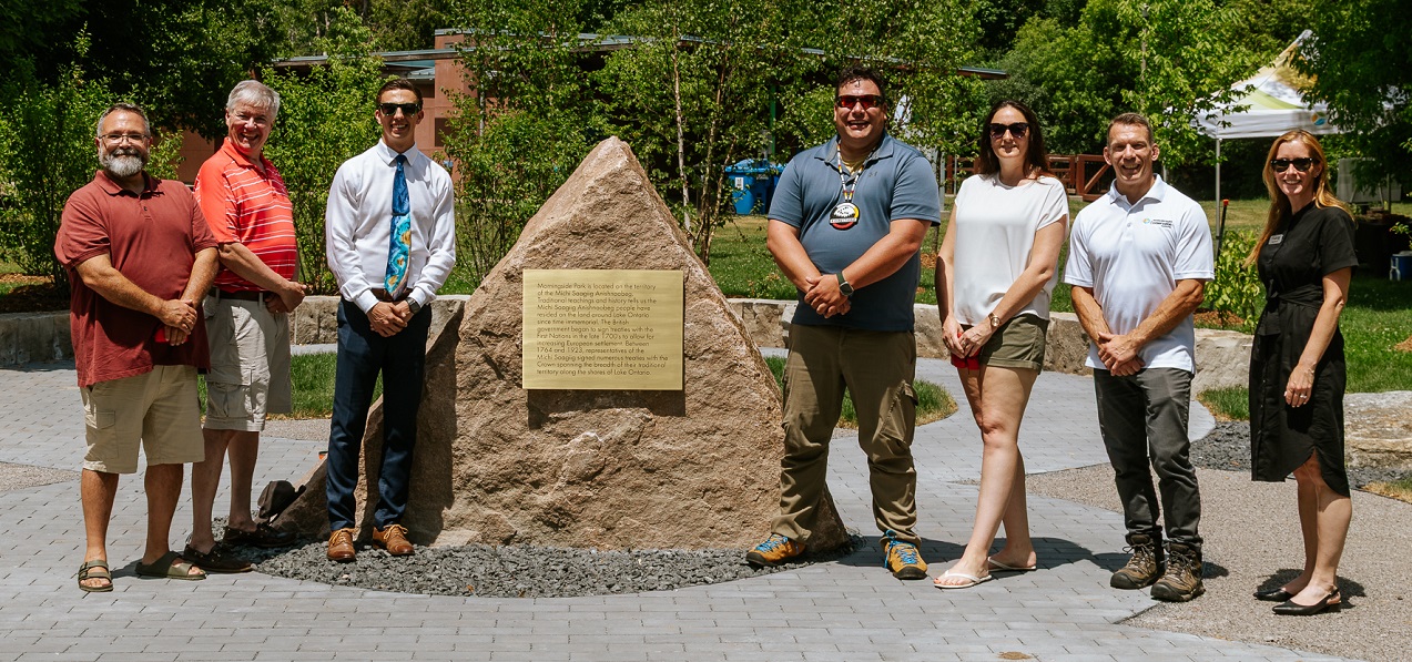 dignitaries gather for a group photo at the private ceremony to mark the completion of the new Indigenous gathering space in Morningside Park