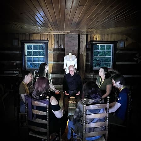 visitors to The Village at Black Creek take part in the Alone in the Dark ghost tour