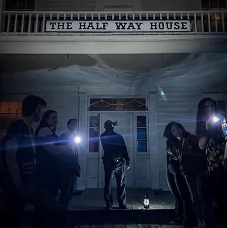visitors to The Village at Black Creek take part in the Alone in the Dark ghost tour
