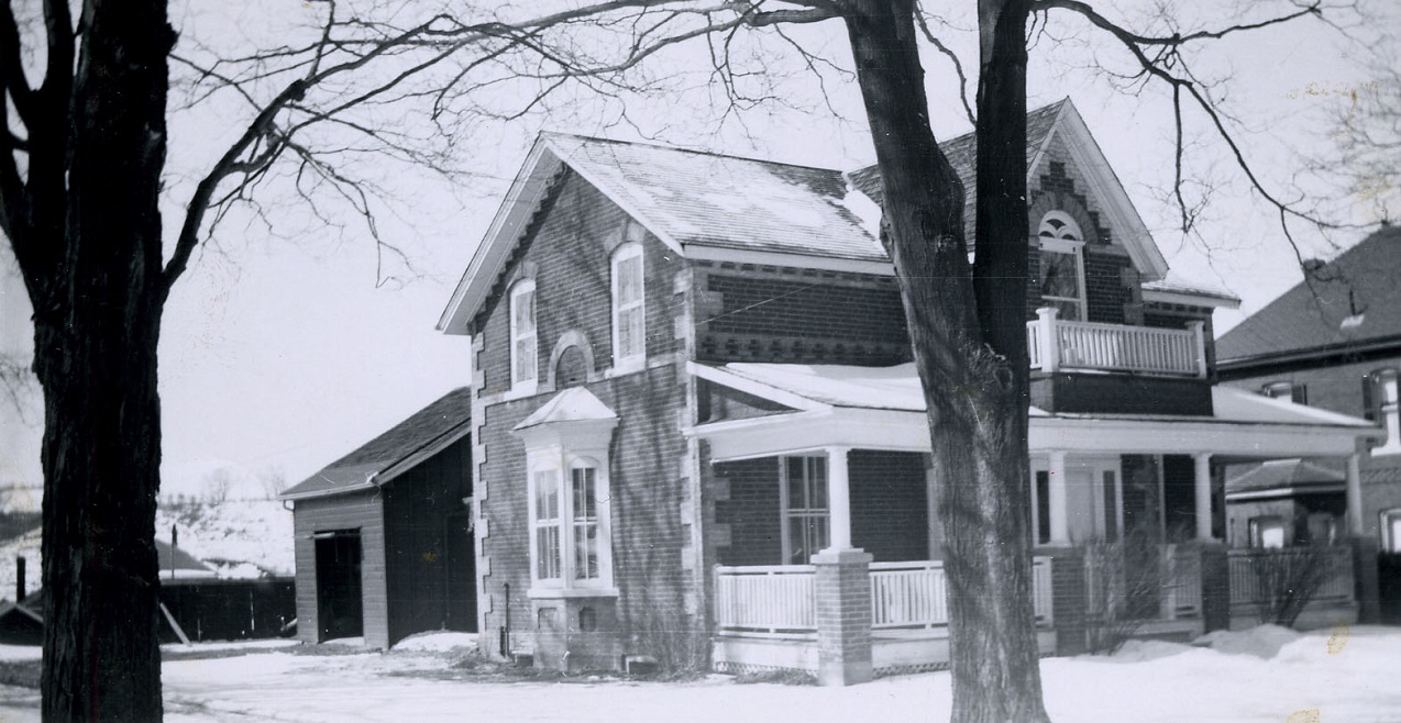 a black and white archival photograph of the George Watson house in Bolton
