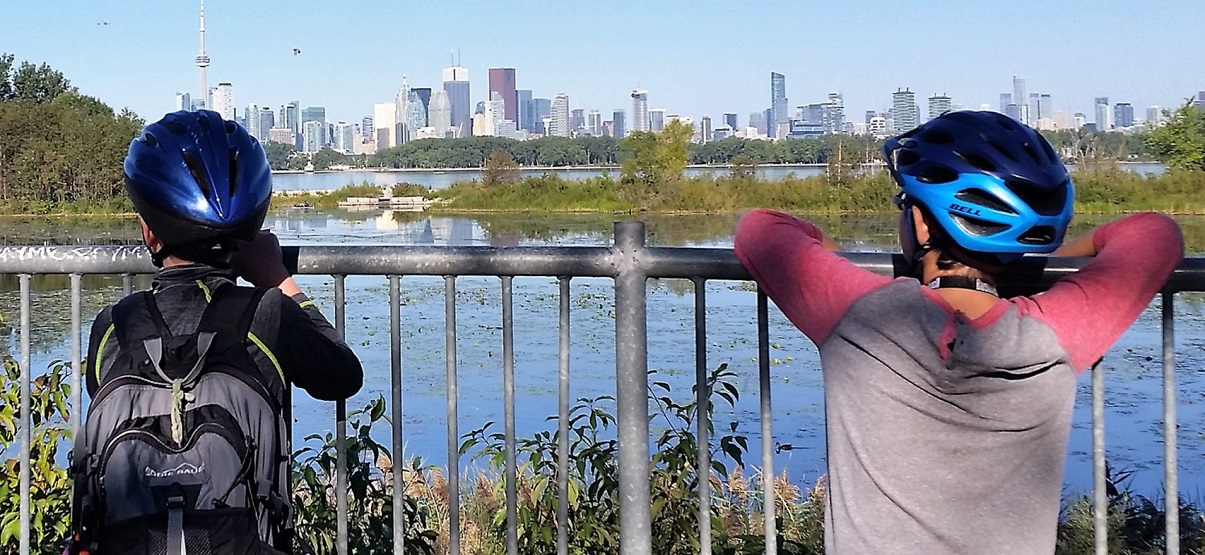 TRCA summer campers view the Toronto waterfront and skyline from a trail at Tommy Thompson Park