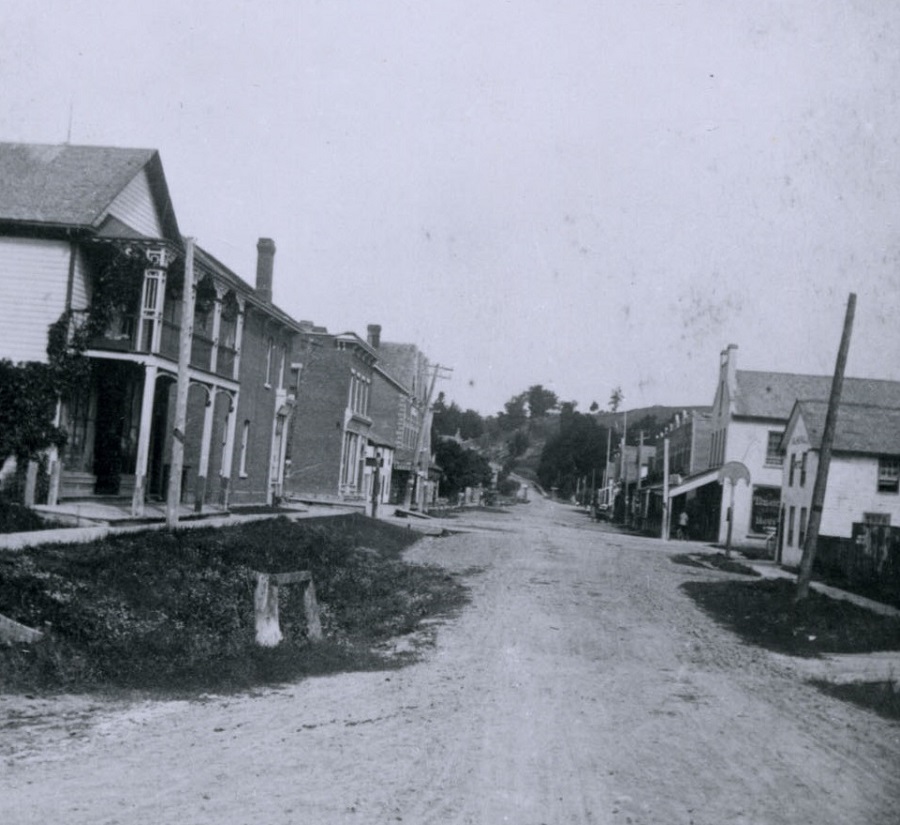 a black and white archival photograph of Queen Street in Bolton in 1897