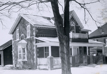 a black and white archival photograph of the George Watson house in Bolton