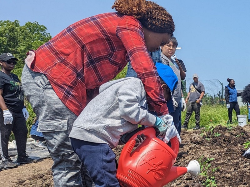 a mother and son take part in a Bramalea SNAP urban agriculture skills training program