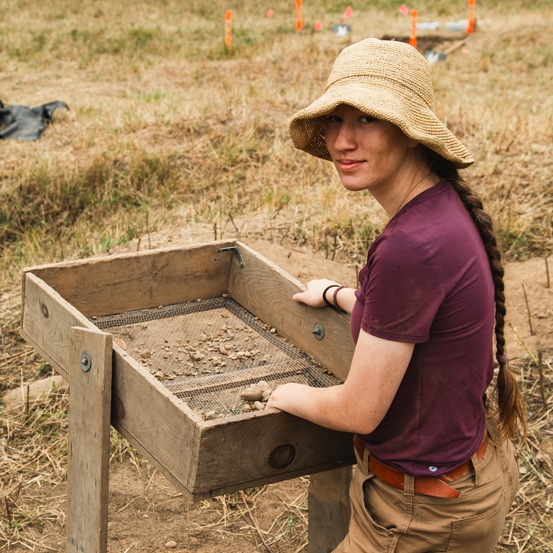 a student takes part in an excavation at the Boyd Archaeological Field School