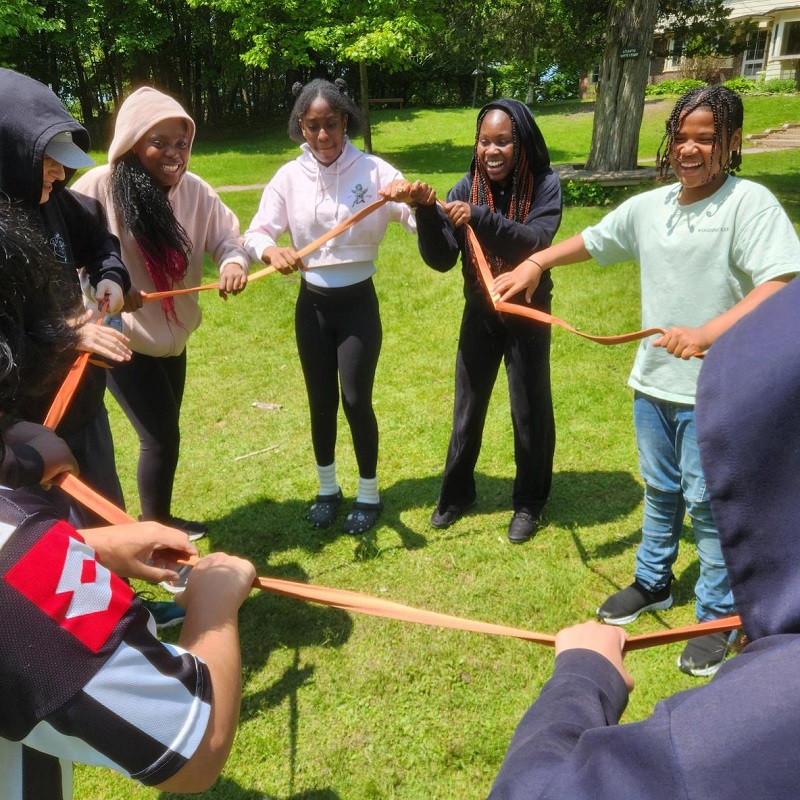 students take part in a team building exercise during an overnight field trip at Lake St George Field Centre