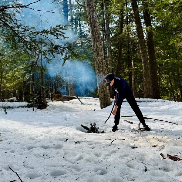 student enjoys outdoor adventure at a winter camp at Claremont Nature Centre