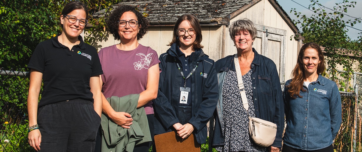TRCA team members and dignitaries participate in a tour of urban agriculture projects in the Rexdale SNAP neigbourhood