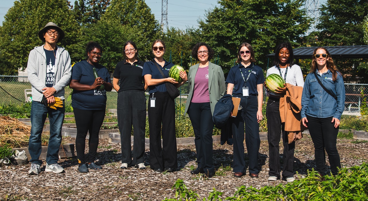 TRCA team members and dignitaries tour an urban agriculture project site in the Rexdale SNAP neighbourhood