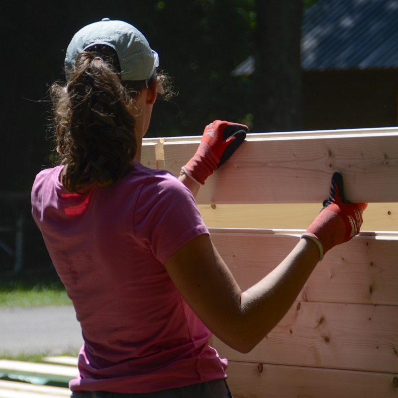 a Girls Can Too program participant works on a construction project