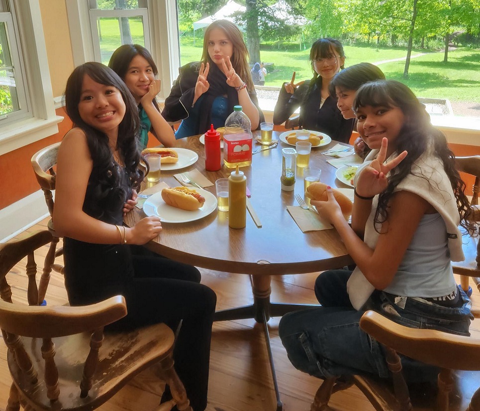 students on an overnight field trip enjoy a hot lunch in the dining area at Lake St George Field Centre