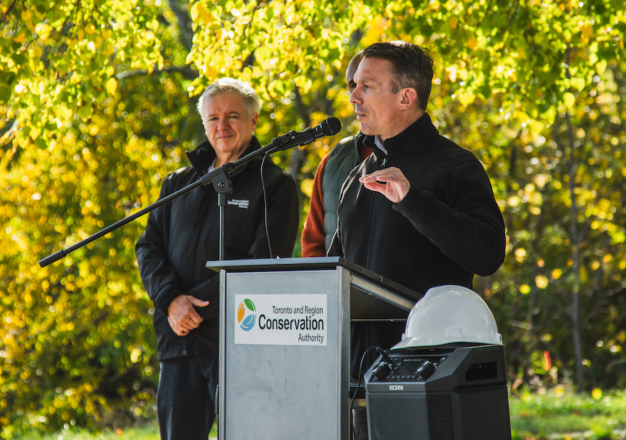 TRCA CEO John MacKenzie delivers remarks at the groundbreaking ceremony for the Brimley Road South Multi-Use Trail as TRCA Board Chair Paul Ainslie looks on
