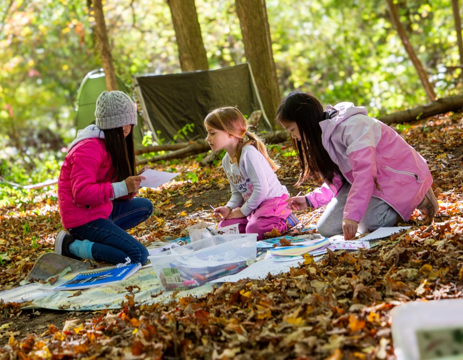 students at The Nature School create art in the natural world