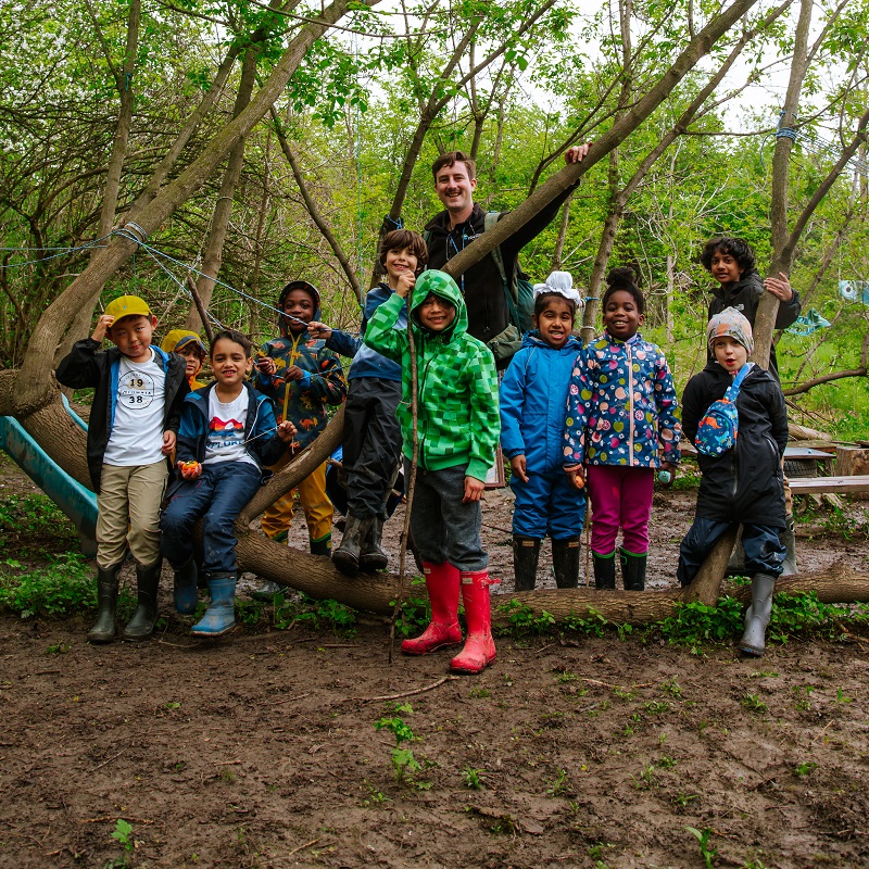 students and teacher enjoy outdoor learning and adventure at The Nature School at Claireville Conservation Area in Brampton