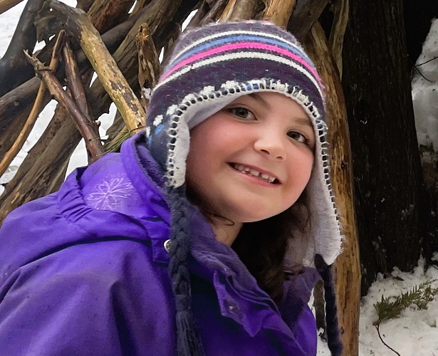 an elementary school student enjoys outdoor adventure during the Welcoming Winter school program at Albion Hills Field Centre