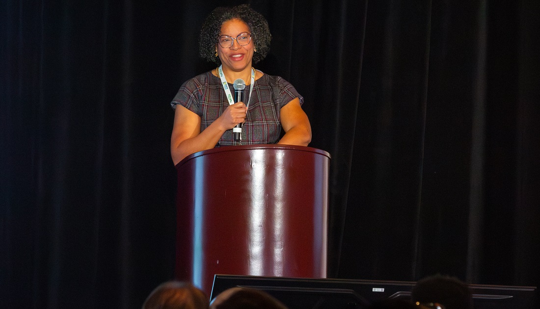 Laurian Farrell delivers a keynote address at the 2025 Source to Stream Conference