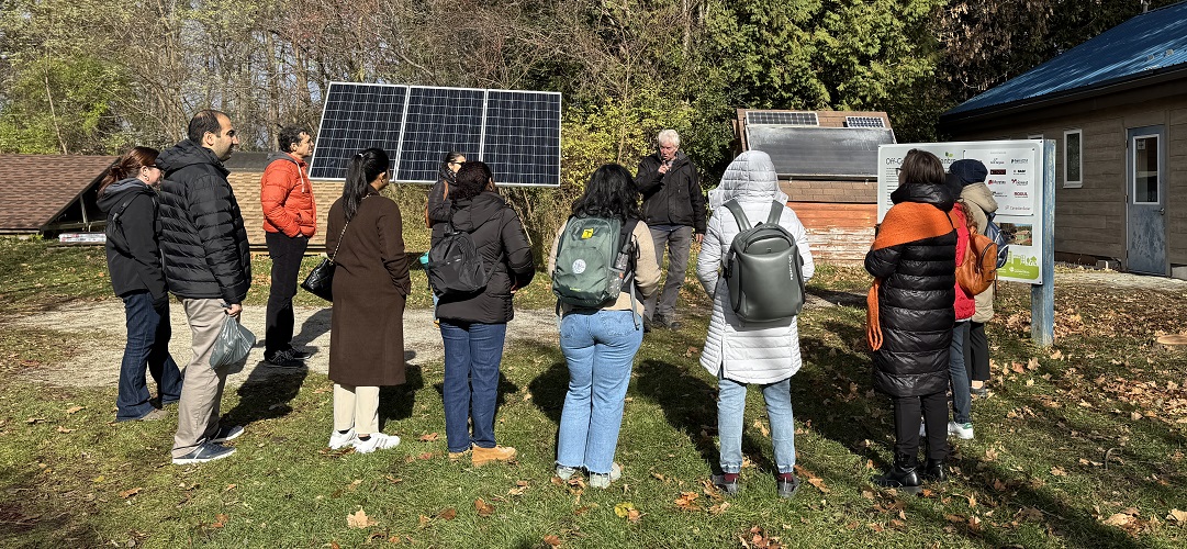a STEP team member leads a tour of the Innovation Trail at Kortright Centre for Conservation