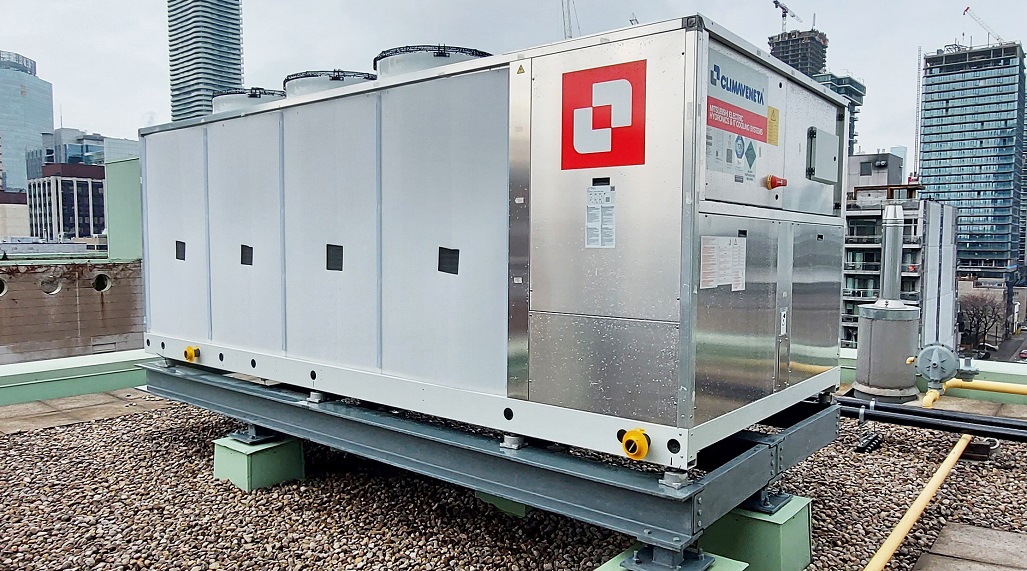 an air source heat pump on the roof of the French Quarter multi-unit residential building in Toronto