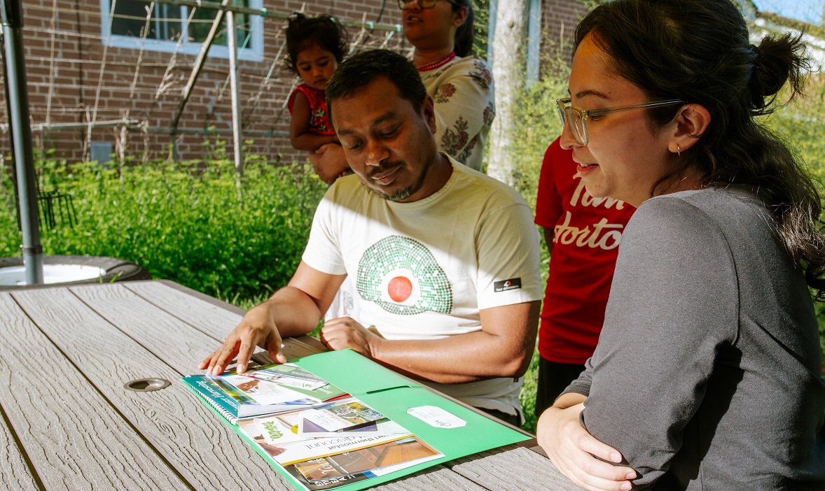 a TRCA team member conducts a home consultation to help a homeowner learn how to take advantage of opportunities offered by the Climate Ready Homes Program