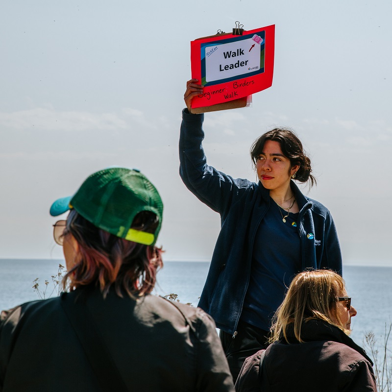 a TRCA team member leads a guided walk at the Spring Bird Festival at Tommy Thompson Park