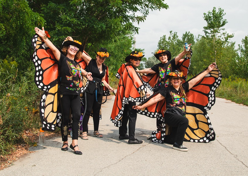 community members wearing Monarch costumes take part in the TRCA butterfly festival at Tommy Thompson Park