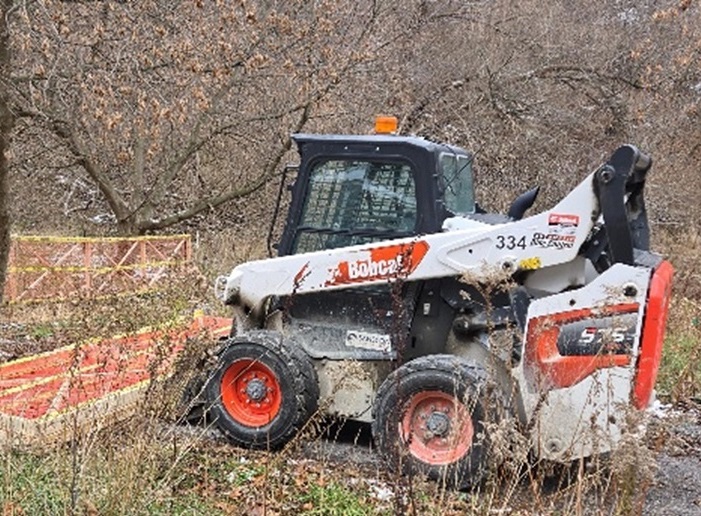 heavy equipment in place for the construction of the Brimley Road South multi-use trail