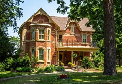 a two-storey brick house on Nancy Street in Bolton