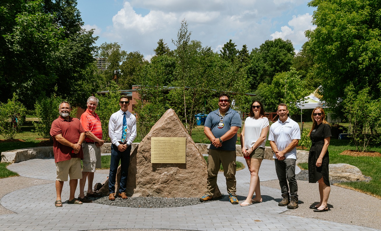 dignitaries gather for a group photo at the private ceremony to mark the completion of the new Indigenous gathering space in Morningside Park